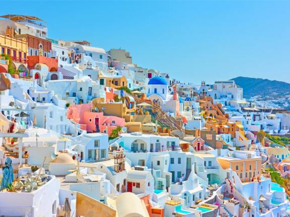 The white-blue panorama of Santorini is a highlight of every charter in the Cycladic Islands