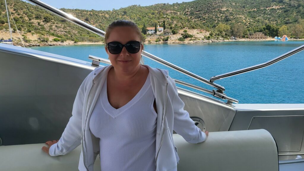 Charter broker Yanna Pristas in the "Love Bay" of Poros (Liminaki Agapis)