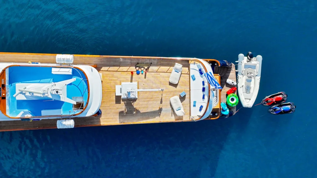 Motor Yacht SOMETHING COOL from above with water toys