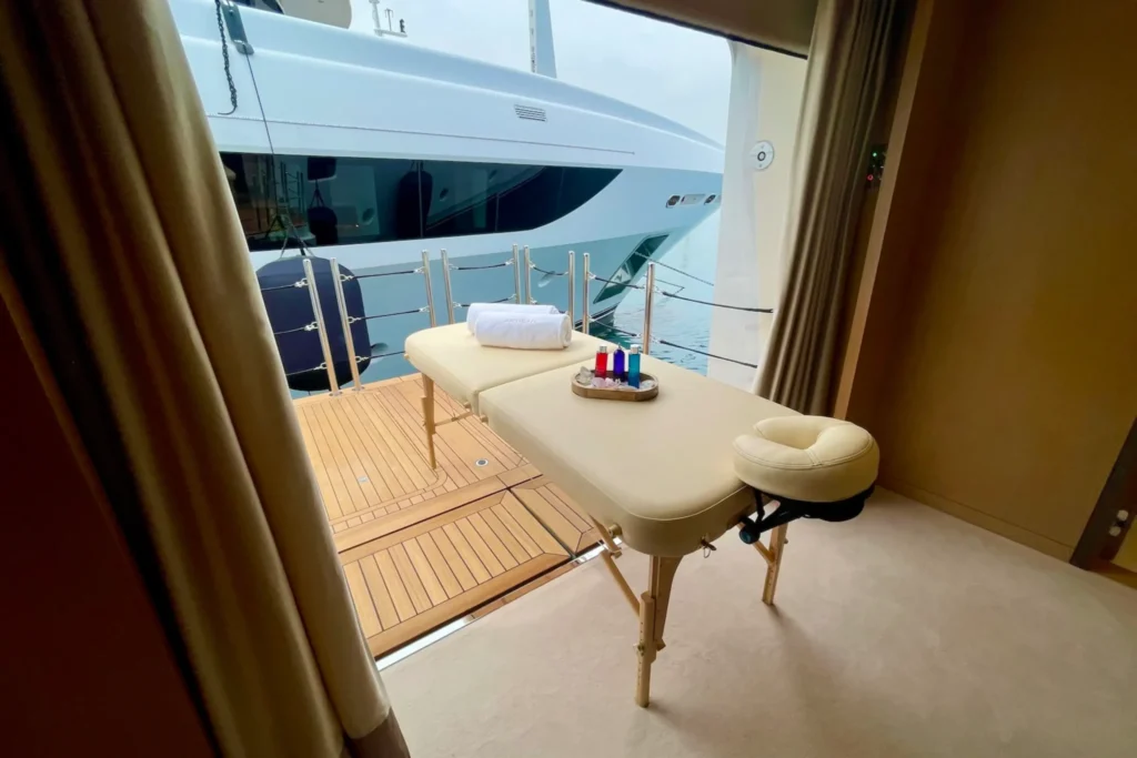 A fold-down balcony with a massage table on superyacht ARTISAN, May 2025.