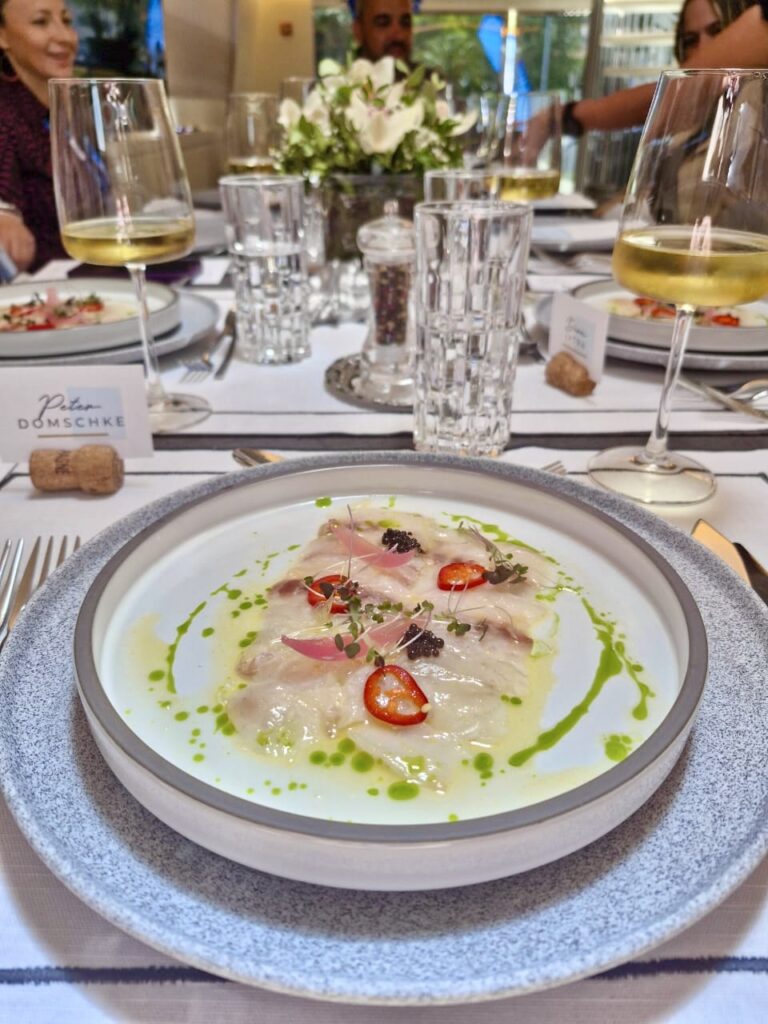 MY EVA serves Sea Bass Carpaccio