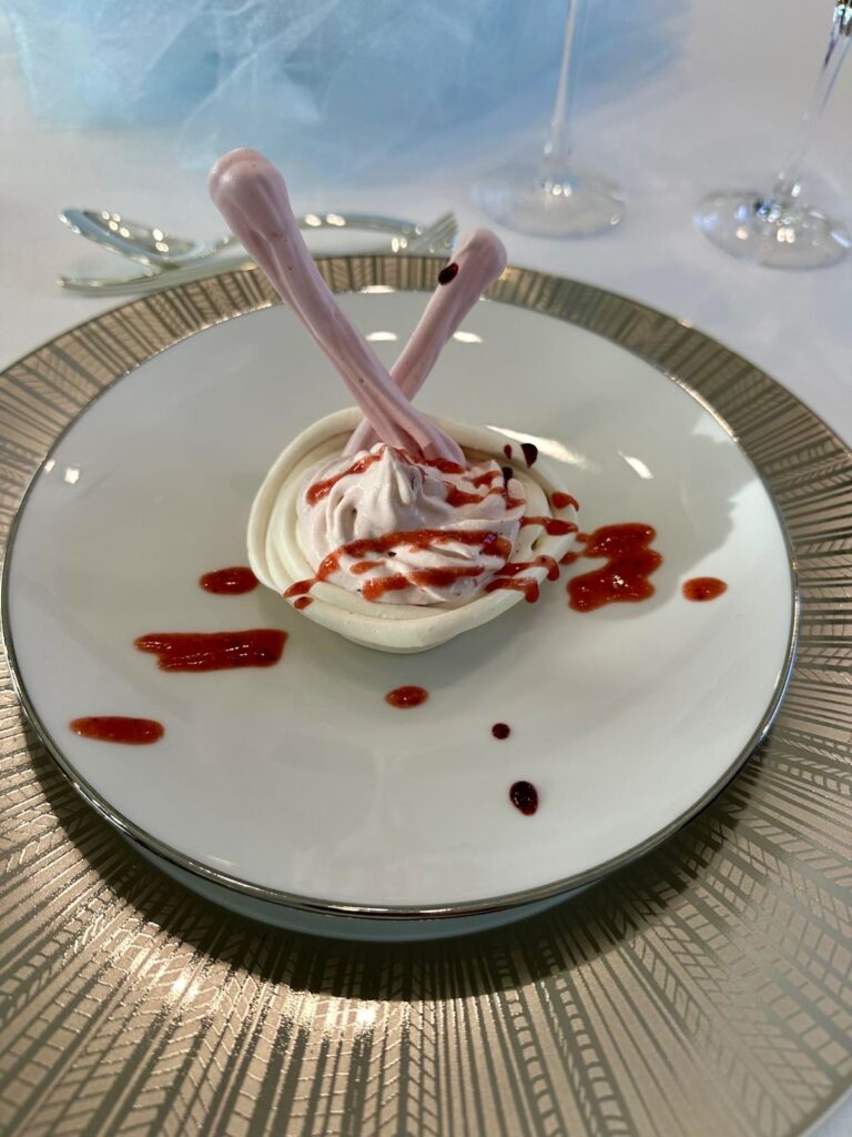 Pavlova with strawberry coulis served on motor yacht HAKUNA MATATA at a broker tasting