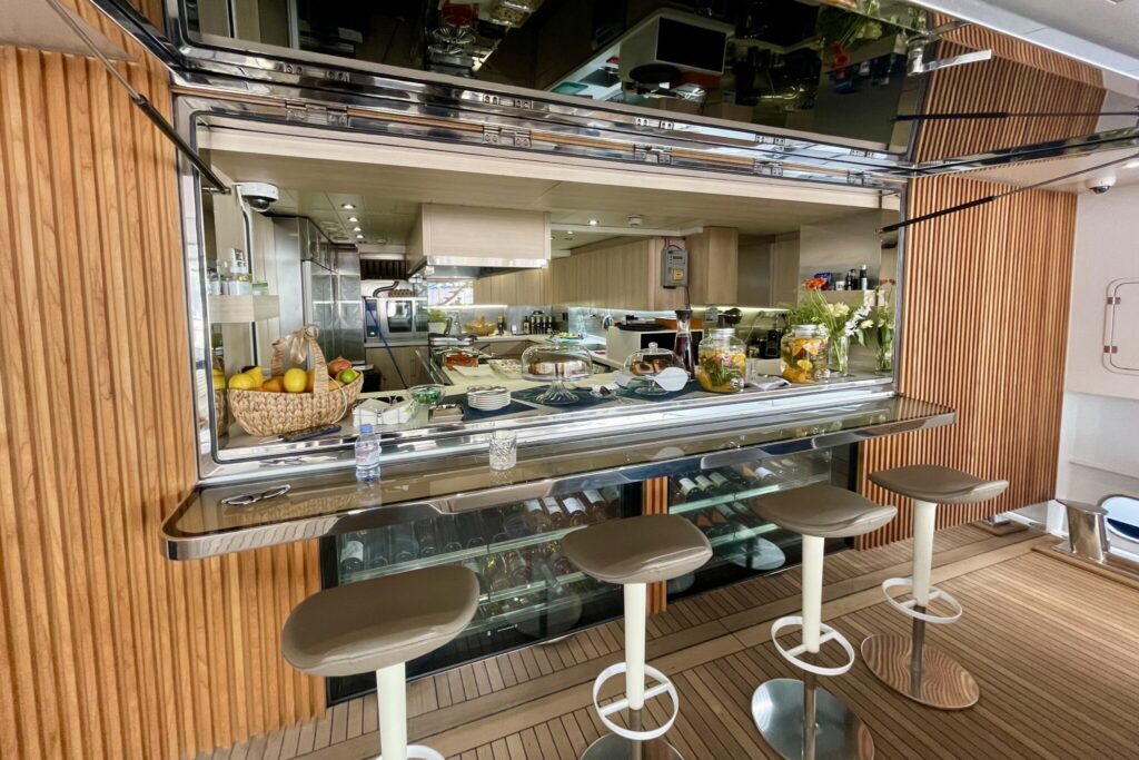 The open galley and bar counter on motor yacht EDEN, fresh fruit on the pass