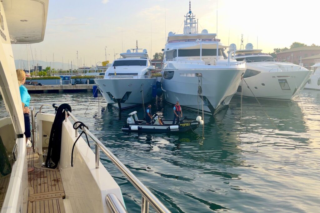 Motor yacht ANKA arriving at the marina in Athens, large motor yachts moored bow to the quay