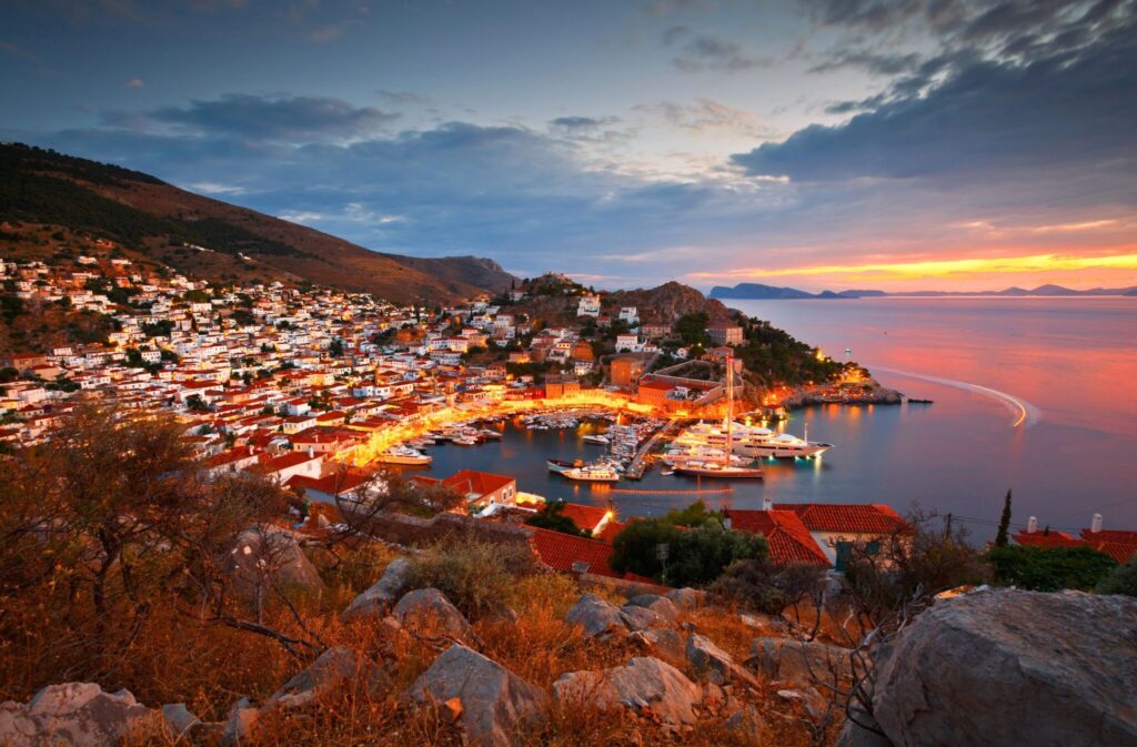 Hydra town and harbor at sunset, Saronic Islands, Greece