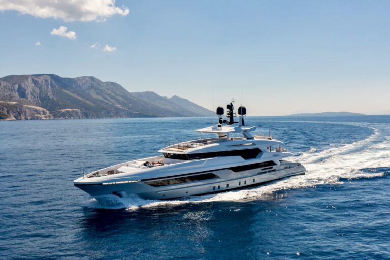Luxury motor yacht MAYVA underway at speed on a clear day