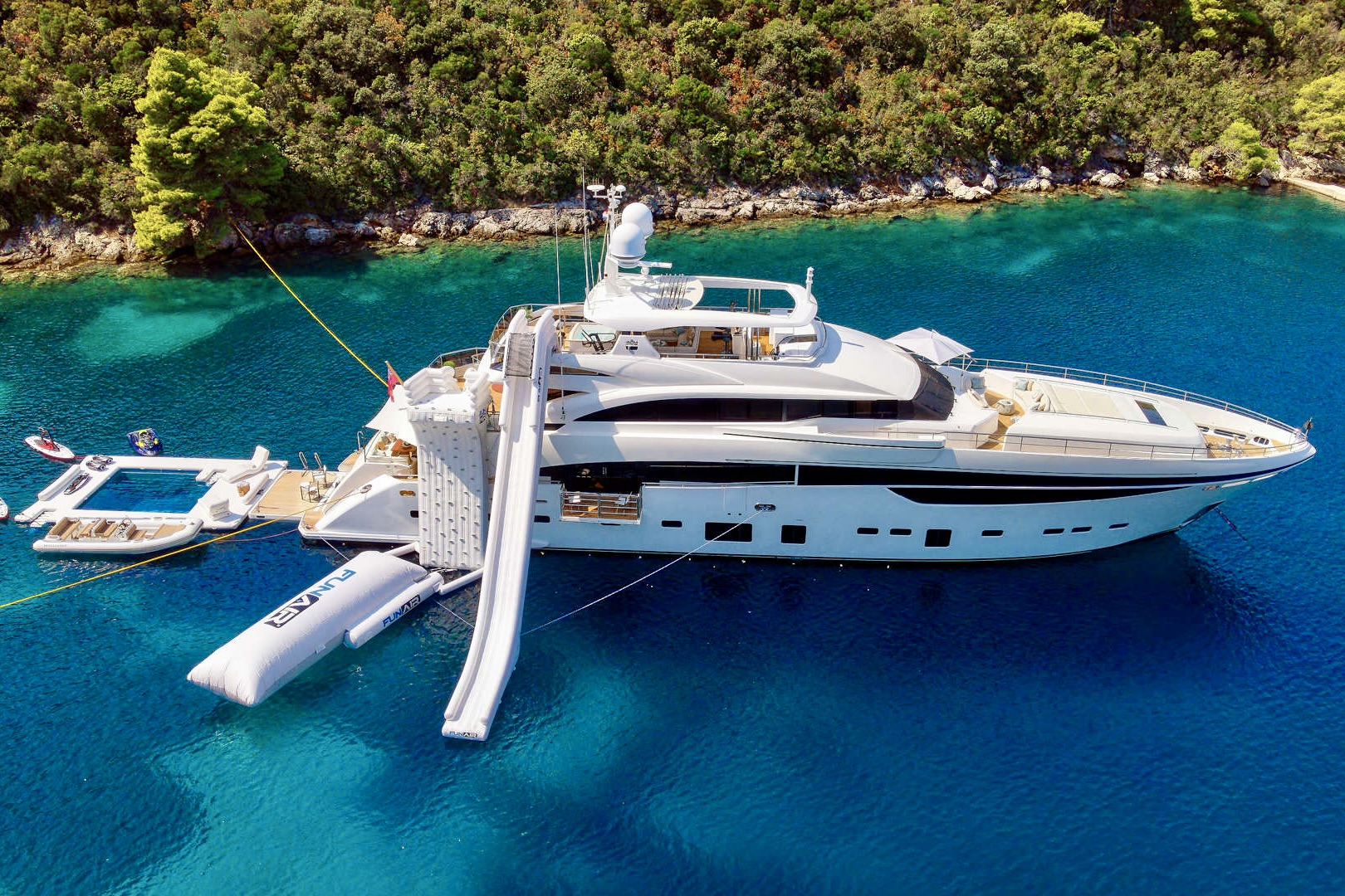 Motor yacht MIRAGE IV anchored with all water toys and slide out