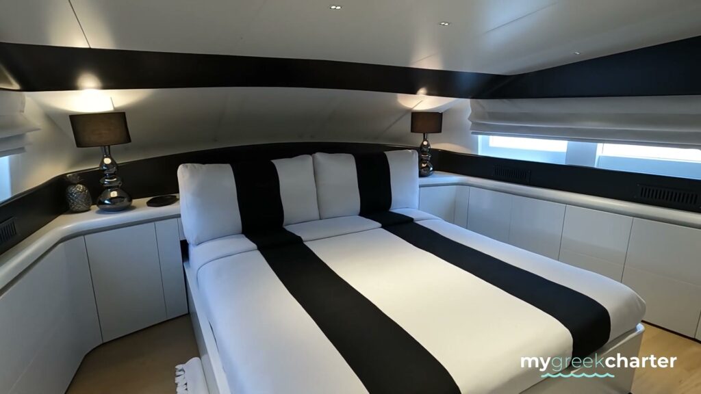 A black and white guest cabin on motor yacht PROJECT STEEL