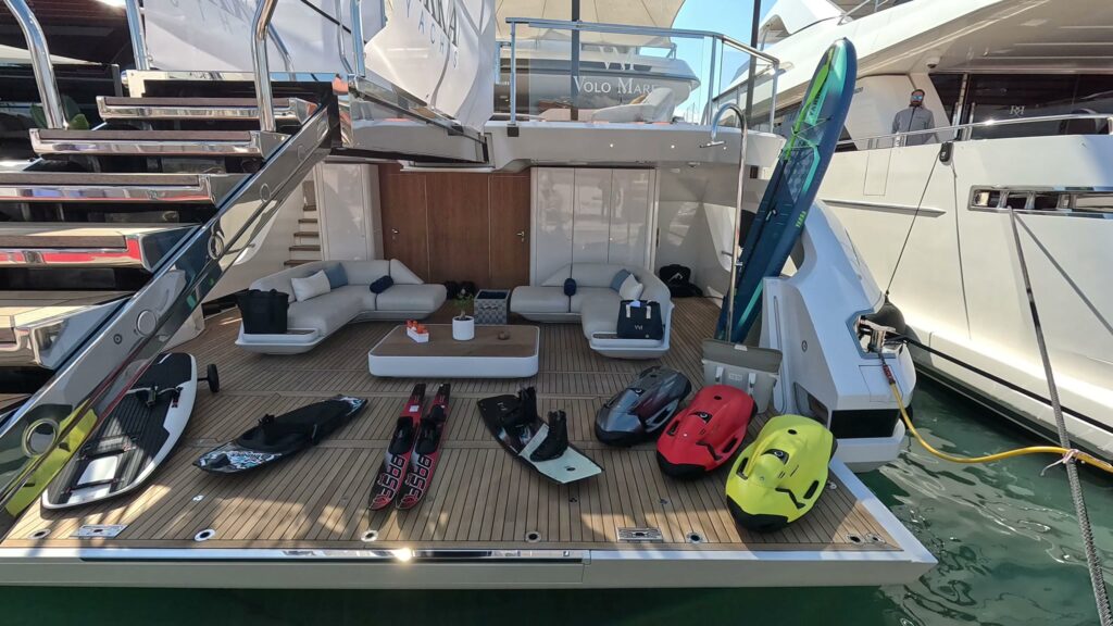 Water toys laid out on the beach club of the 125 ft Azimut motor yacht VOLO MARE