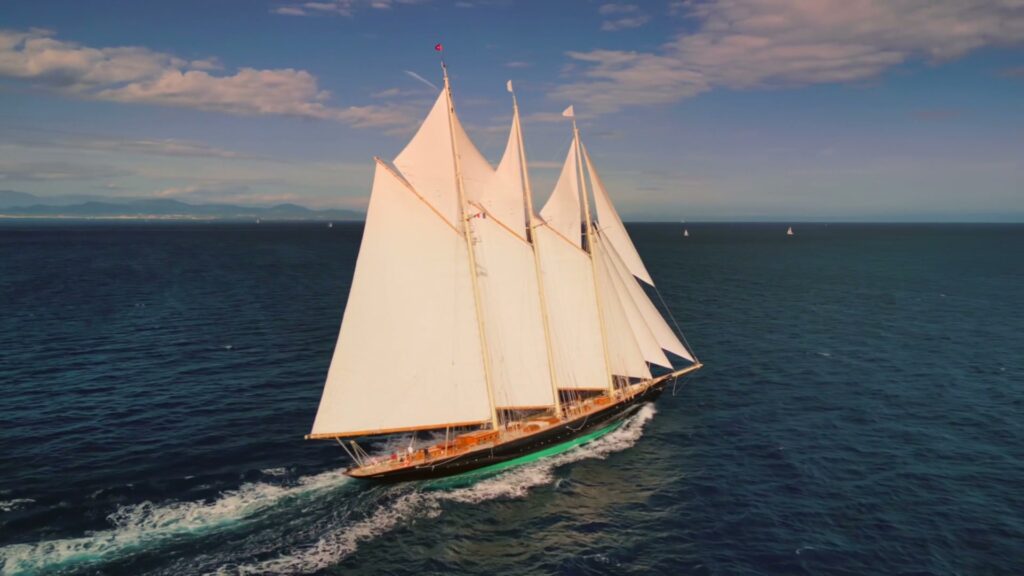The three-masted schooner ATLANTIC under full sail on open water