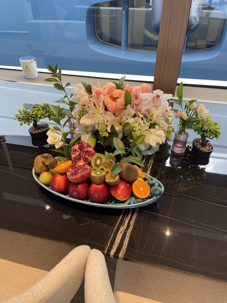 Flowers and a fruit bowl in the saloon of motor yacht ARESYA, May 2026.