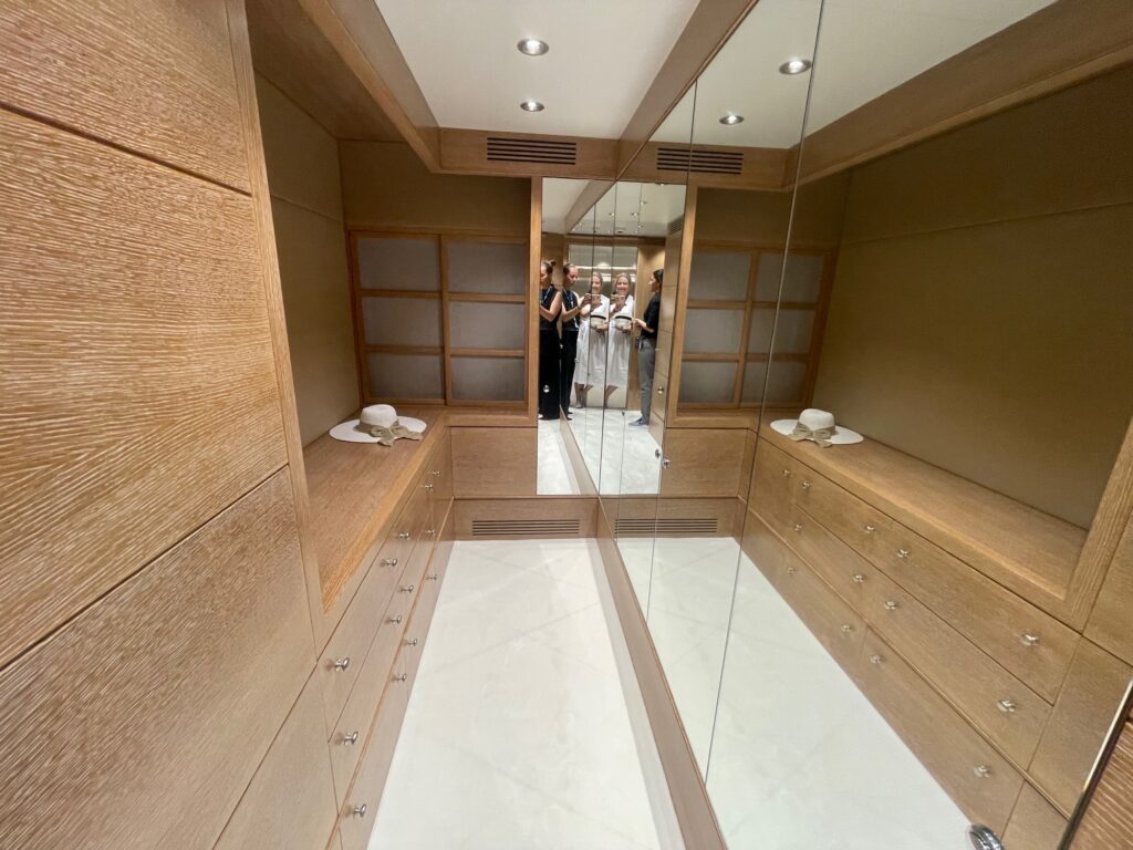 The walk-in wardrobe of ARTEMISEA's master cabin