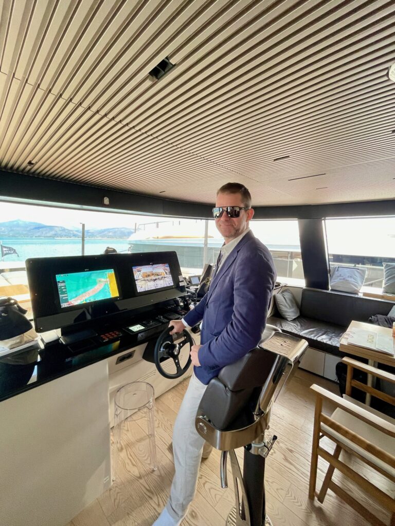 John Boullin of DMA Yachting at the helm of BESTIA