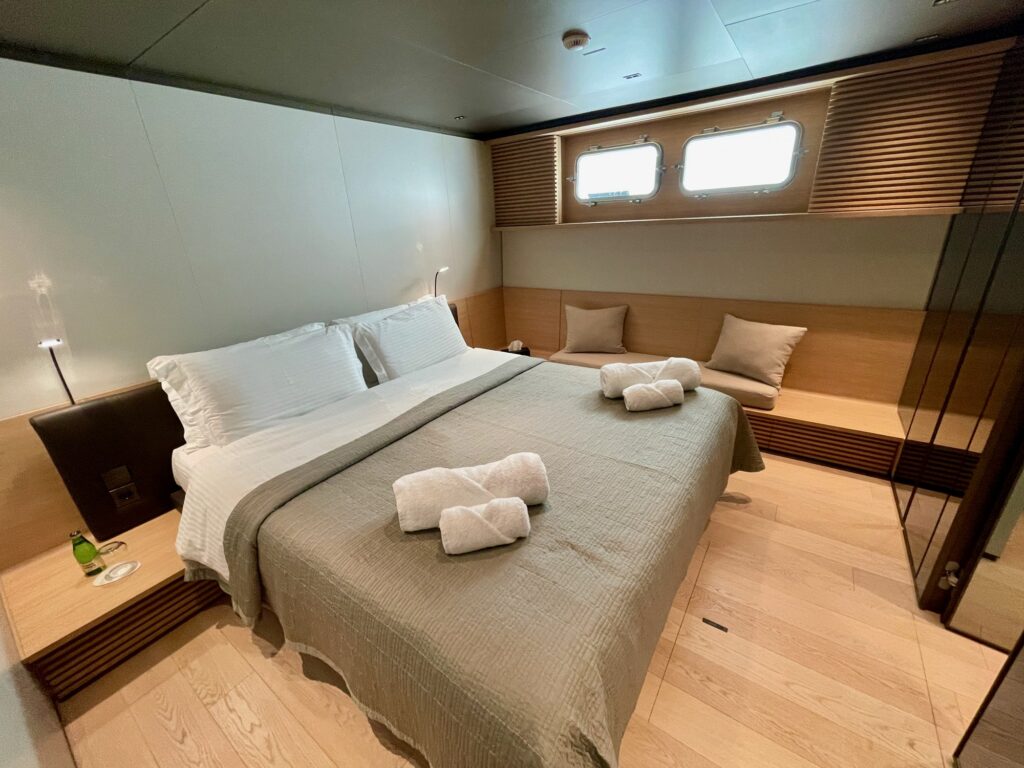 BESTIA's master cabin with the bed under the hull windows