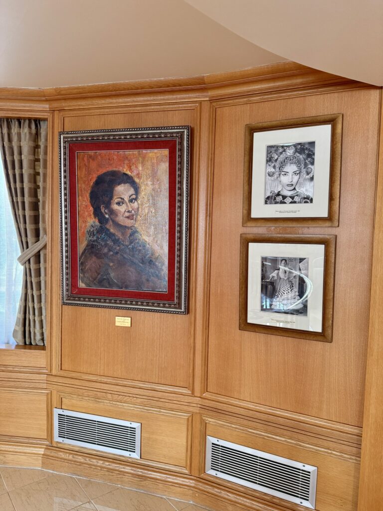 CHRISTINA O, the Maria Callas portrait and framed photographs in the lounge