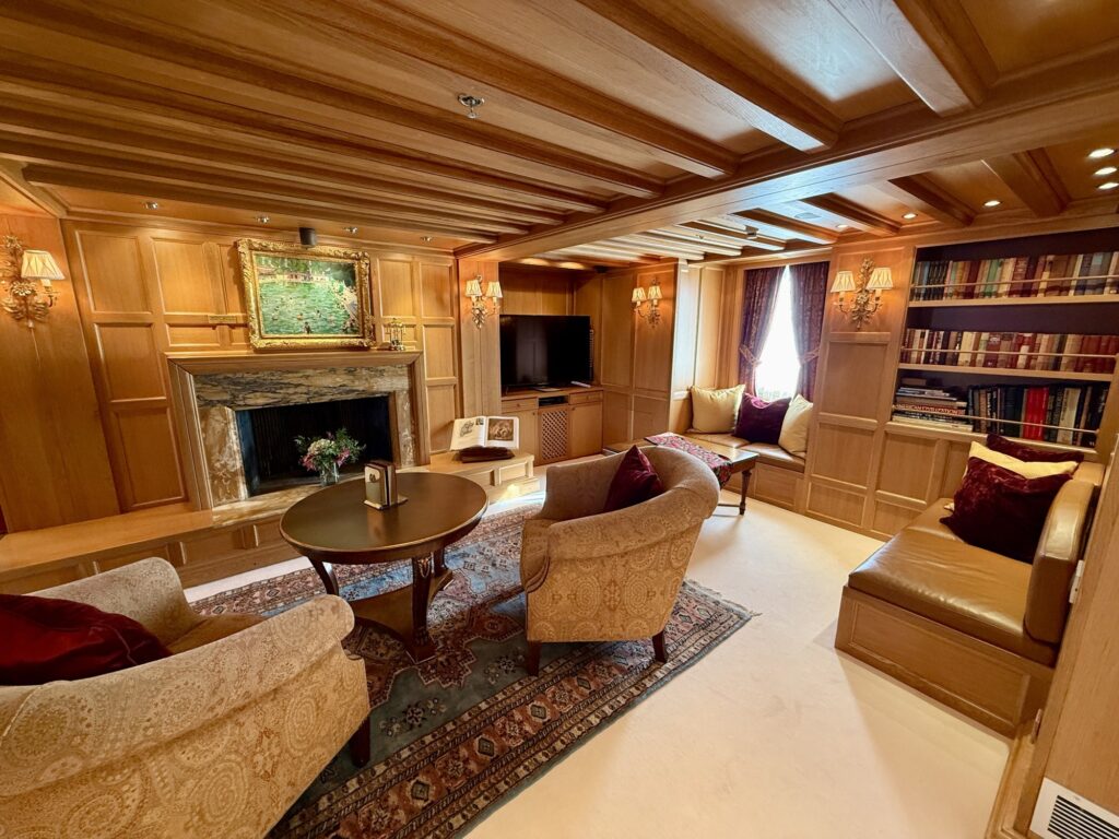 CHRISTINA O, the oak study with the fireplace in the Onassis Suite