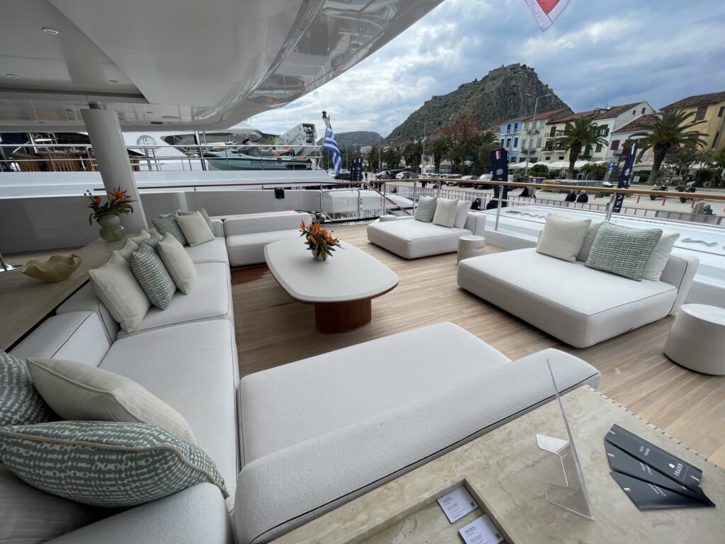 The sundeck lounge on motor yacht O'MADELEINE in Nafplion, May 2026.