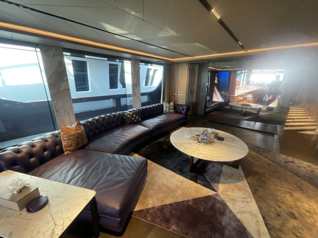 The lounge with leather sofas on motor yacht RAJA 2, April 2026.