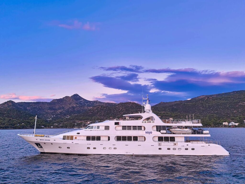 SOJO, a 177 foot Benetti superyacht, in Greece at dusk