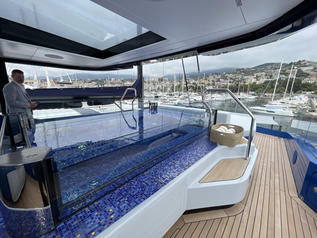 The mosaic-tiled deck pool on motor yacht SUI GENERIS, April 2026.