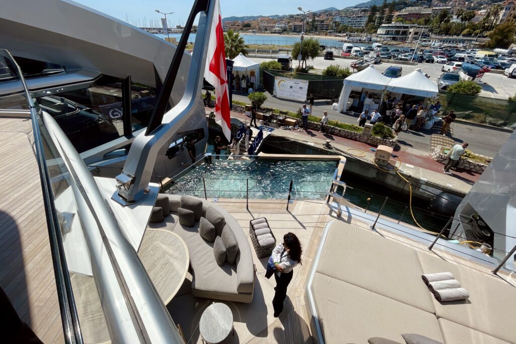 View from the master cabin balcony of THIS IS IT down to the aft-deck jacuzzi and lounge