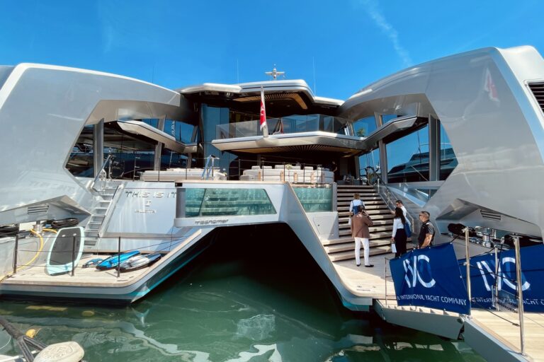 Stern view of the 43m Tecnomar THIS IS IT with her two curved staircases and the water-level platform