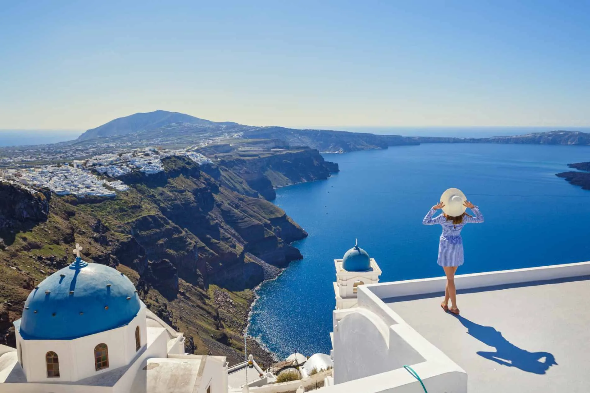 Whitewashed Cyclades village above the Aegean Sea