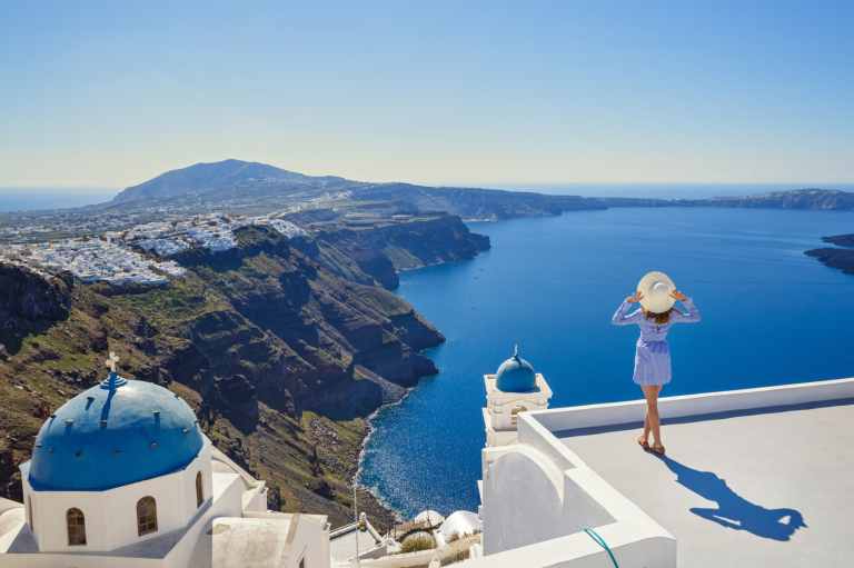 Whitewashed Cyclades village above the Aegean Sea