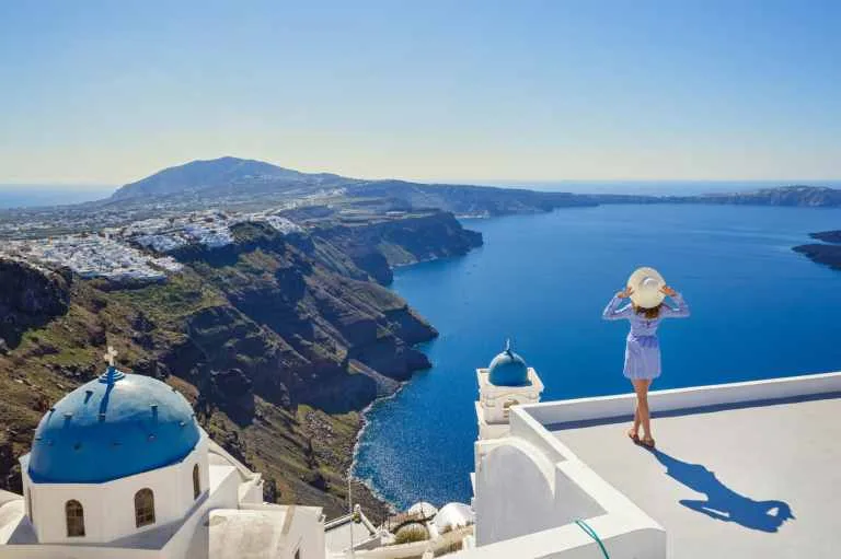 Whitewashed Cyclades village above the Aegean Sea