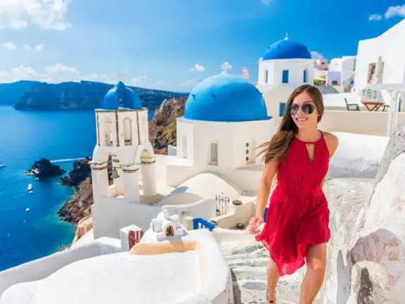 A trick image - the Blue Domed Church is in Oia, not far from Fira. The steep cliffs deserve your constant attention, especially with kids or doing selfies.