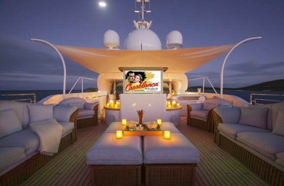 Caseblanca playing on the screen on the topdeck cinema on luxury motor yacht Starfire