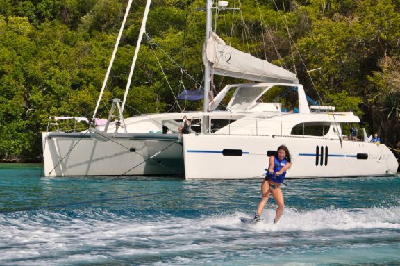 Girl wakeboard, BVI crewed catamaran TRANQUILITY