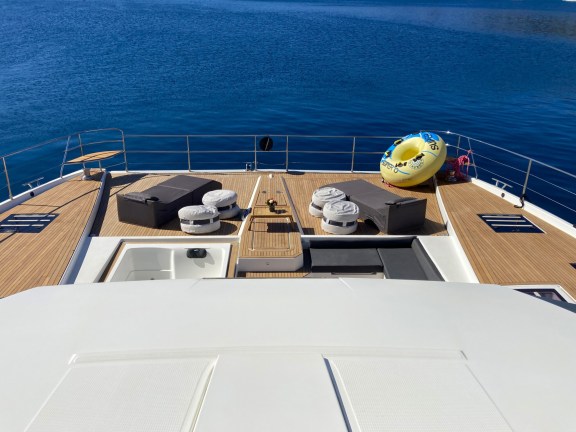 The stunning teak foredeck with Jacuzzi on this Fontaine Pajot Power 67, ChristAl Mio, at the East Med Yacht Show 2024, Poros, Greece