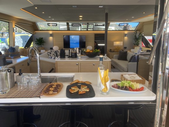 Catamaran Tiamo showcases this concept beautifully with a bar that serves both the saloon and opens up to the aft deck