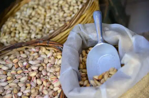 Big woven baskets full of pistachios