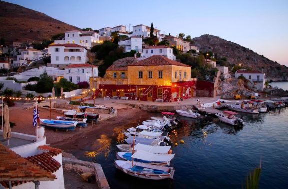 Waterfront in the evening on Hydra Island in Greece.