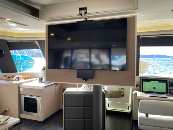 Electrically controlled fold-down tv on Catamaran Namaste, at the East Med Yacht Show 2024 in Poros