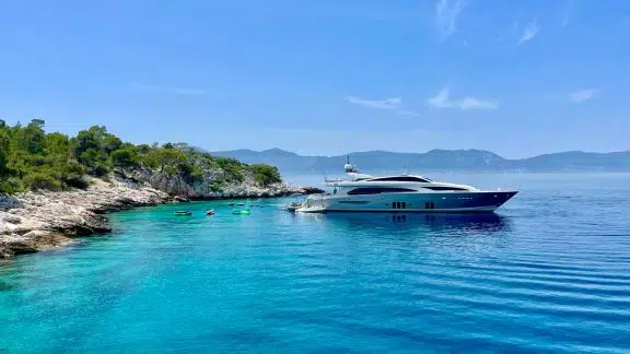 Greece yacht charter anchored stern to at Korakia Island in Greece