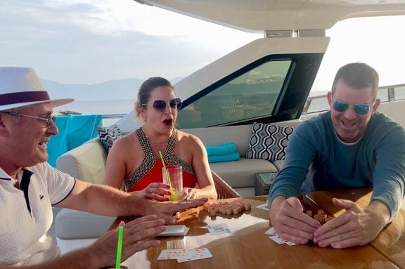 Guests of motor yacht ANKA plays Texas Hold'em on the flybridge