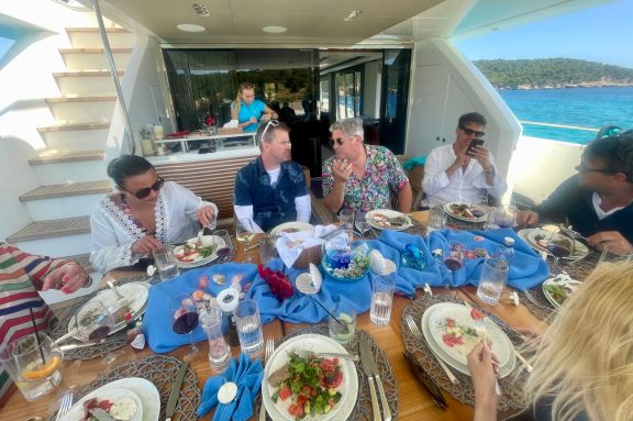 Lunch served on the back deck of motor yacht ANKA at Karakia Island