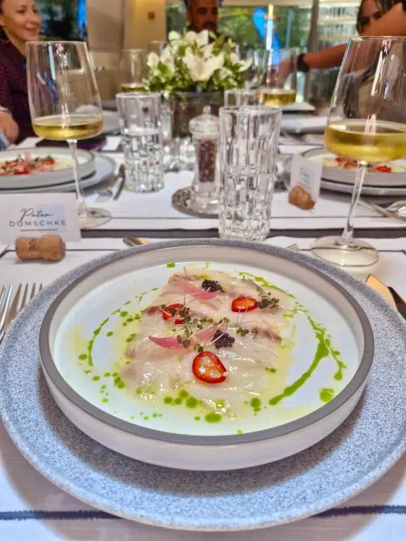 MY EVA serves Sea Bass Carpaccio