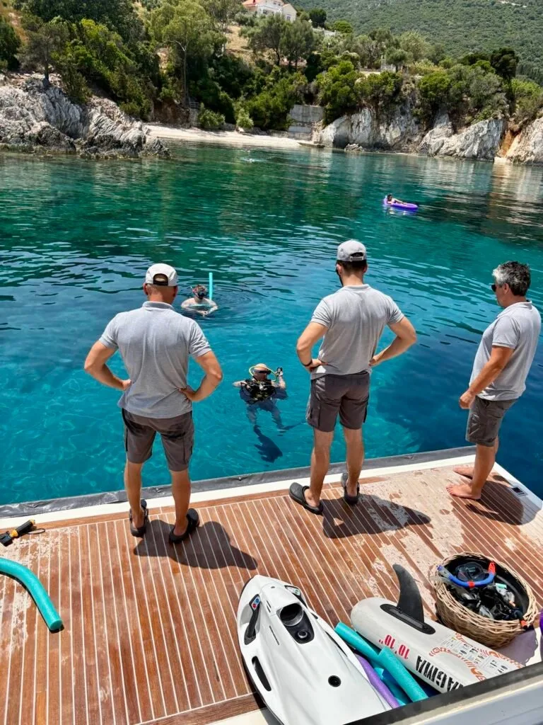 Crew and guests with water toys