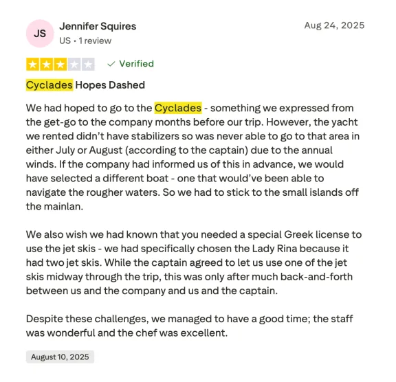 Screenshot of a Trustpilot review describing disappointment with a Cyclades yacht charter affected by weather and yacht limitations.