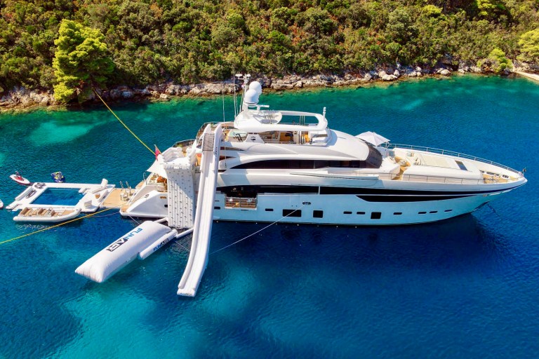 Motor yacht MIRAGE IV anchored with all water toys and slide out
