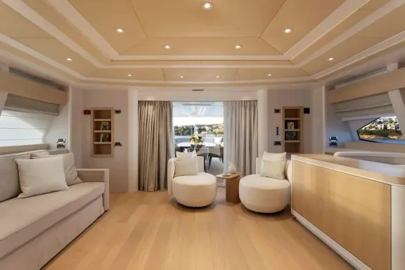 Salon of the 1st Master Cabin on Upper Deck. It has a large private veranda and it can become a common area used by all guests if separated from the cabin with the sliding door. The salon sofa can be coverted to a double bed, so the upper deck can sleep 4 guests.