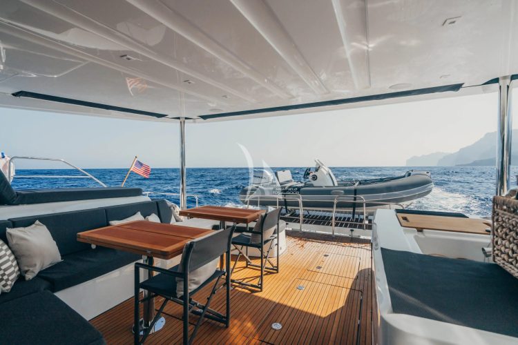 Aft deck with convertible dining table