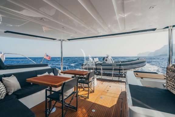 Aft deck with convertible dining table