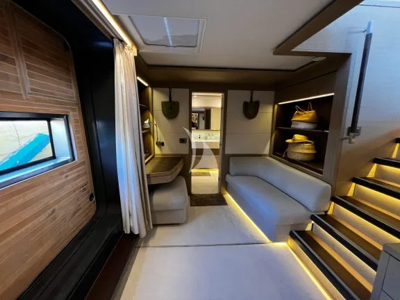 Stairs to Master Cabin with desk and sofa
