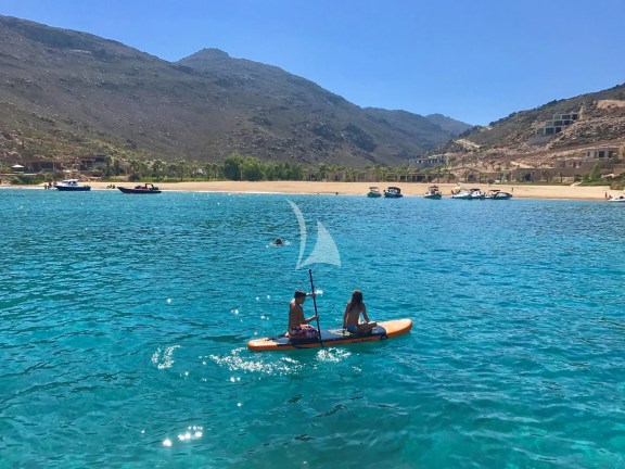Enjoying Water Toys in one of the many amazing beaches of Ios Island, Cyclades