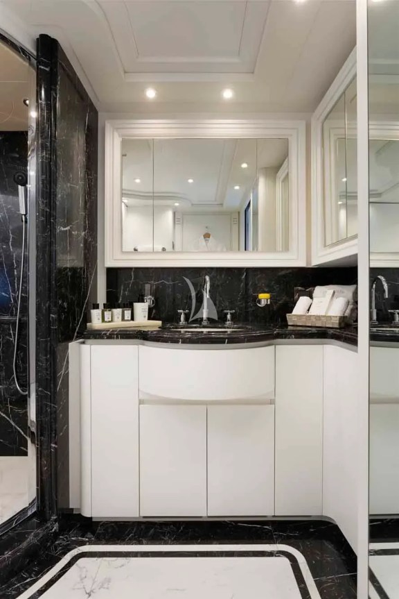 The exceptionally spacious en suite bathroom of the 2nd Master cabin (main deck) has 2 separate toiets, 2 sink units, 2 doors, a large shower & lots of stoarge space